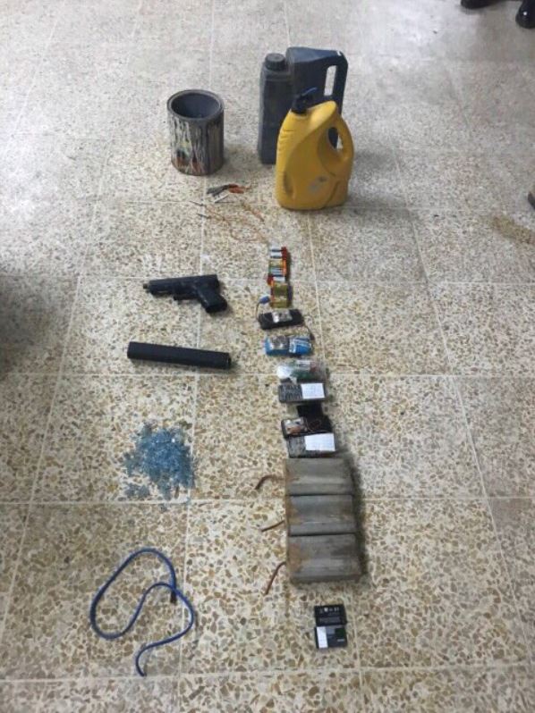 Nineveh intelligence directorate managed , through confessions of one of the defendants , to seize a workshop for manufacturing IEDs and silencers in the left side of Mosul city (2)